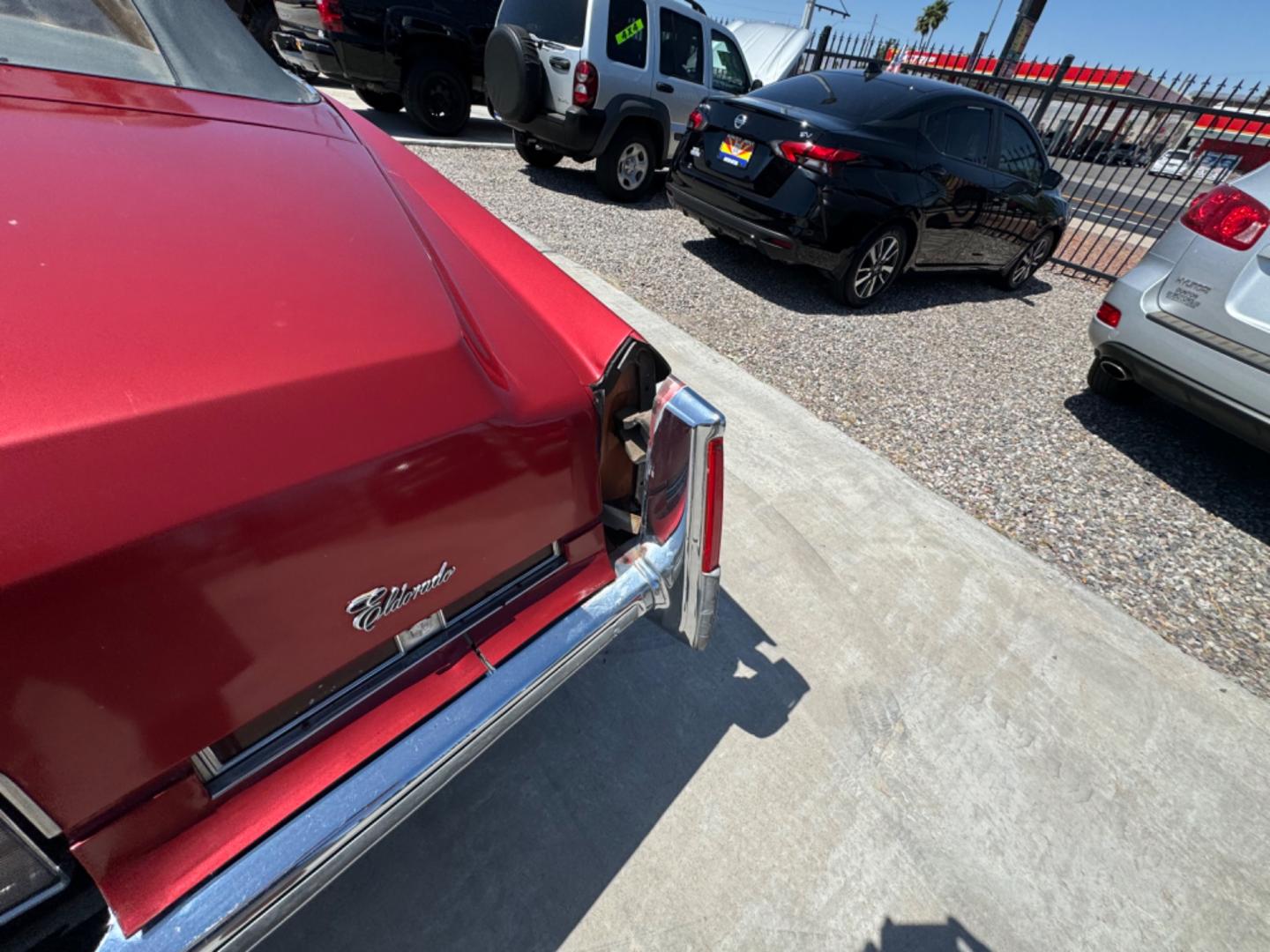 1975 Red Cadillac Eldorado convertible. , located at 2190 Hwy 95, Bullhead City, AZ, 86442, (928) 704-0060, 0.000000, 0.000000 - 1975 Cadillac Eldorado Convertible. Great project car for someone. New tires. Runs and drives, power top works. has a/c doesn't work. needs restoration. interior needs work, engine needs to be serviced . clear title. - Photo#11